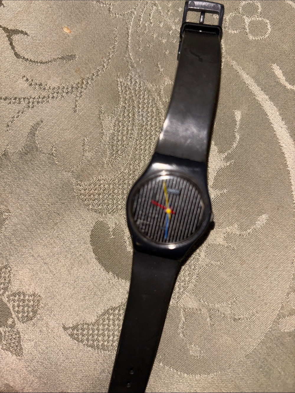 Swatch Black Silicone Watch with Yellow, Red and Blue Hands
